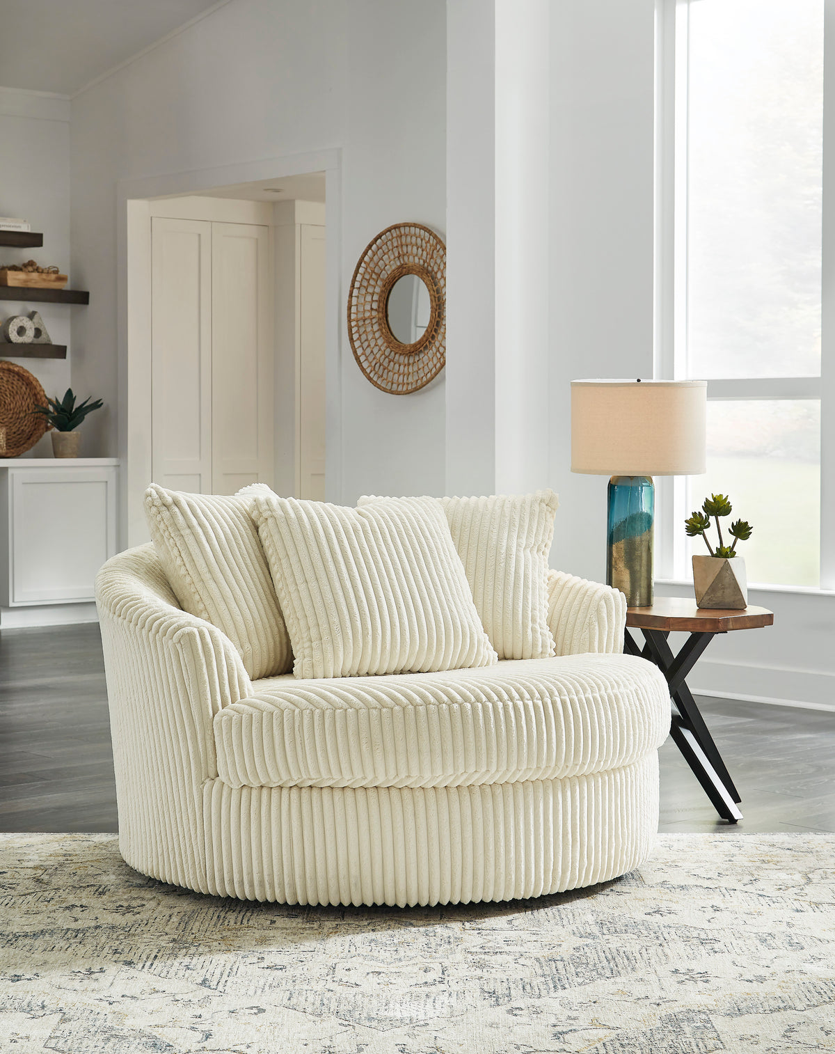 Sillón giratorio extragrande Lindyn color marfil