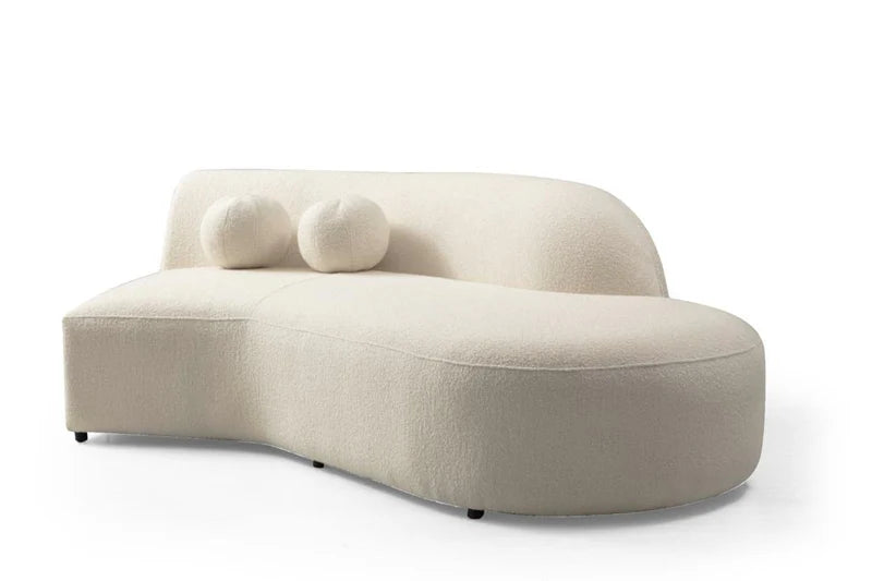 Seccional curvo de bucle color marfil Cloe