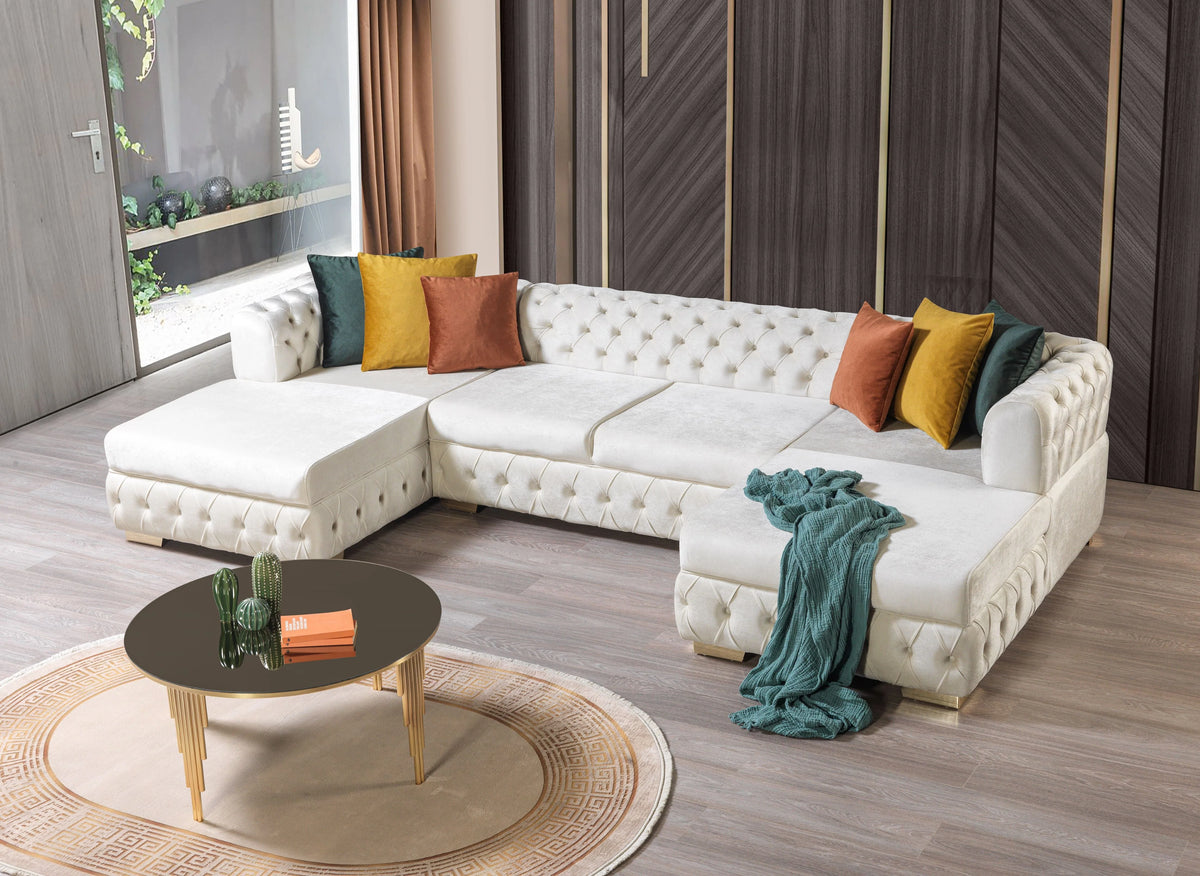 Sofá seccional doble chaise Matilda de terciopelo marfil con mechones
