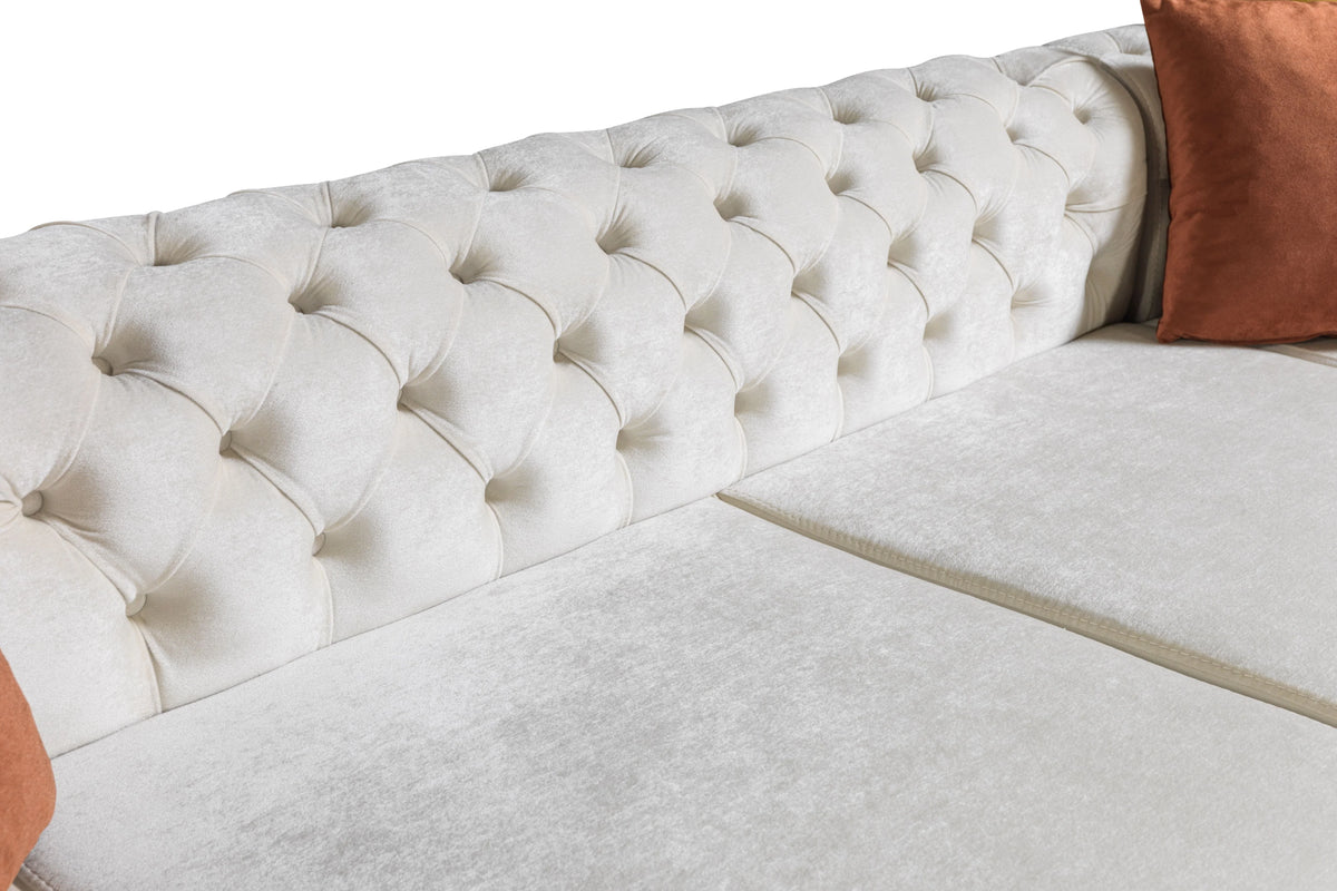 Sofá seccional doble chaise Matilda de terciopelo marfil con mechones