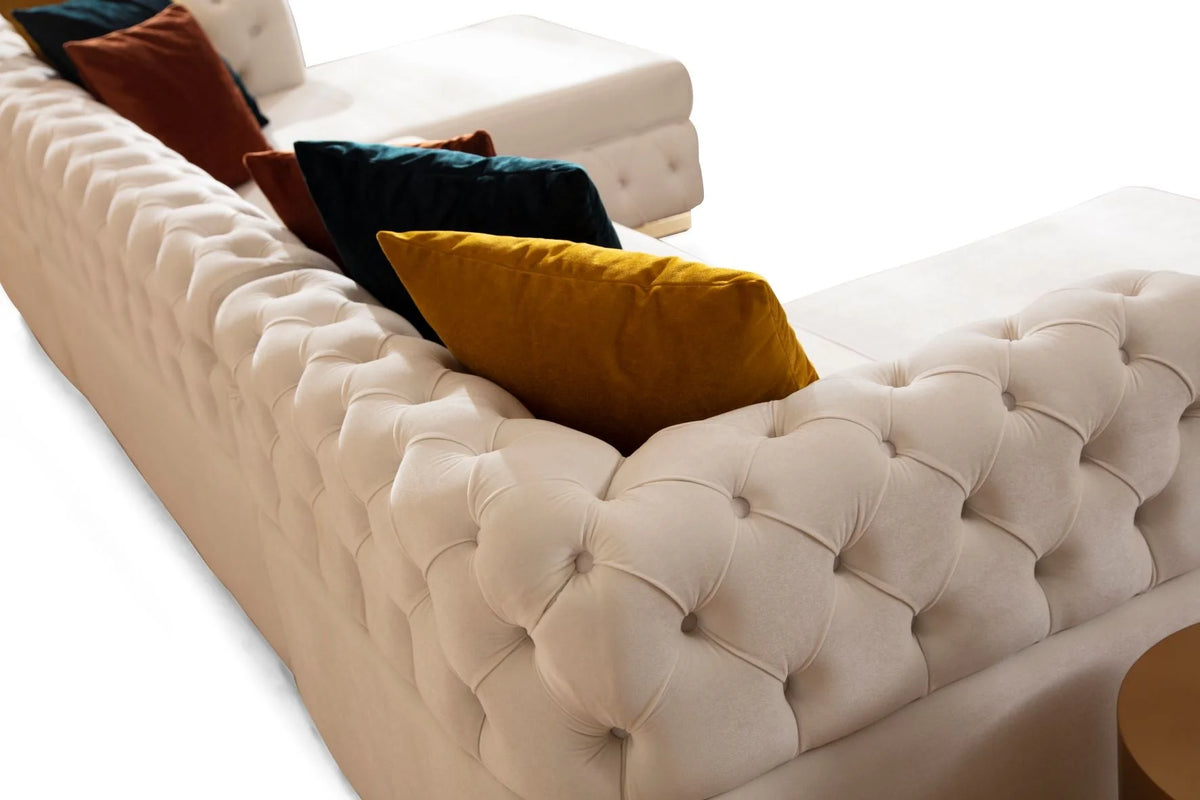 Sofá seccional doble chaise Matilda de terciopelo marfil con mechones