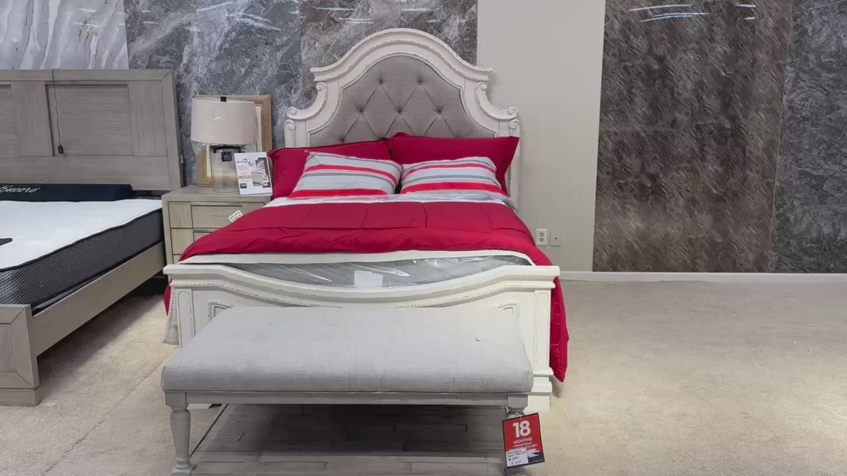 Load video: Realyn Chipped White Queen Upholstered Panel Bed